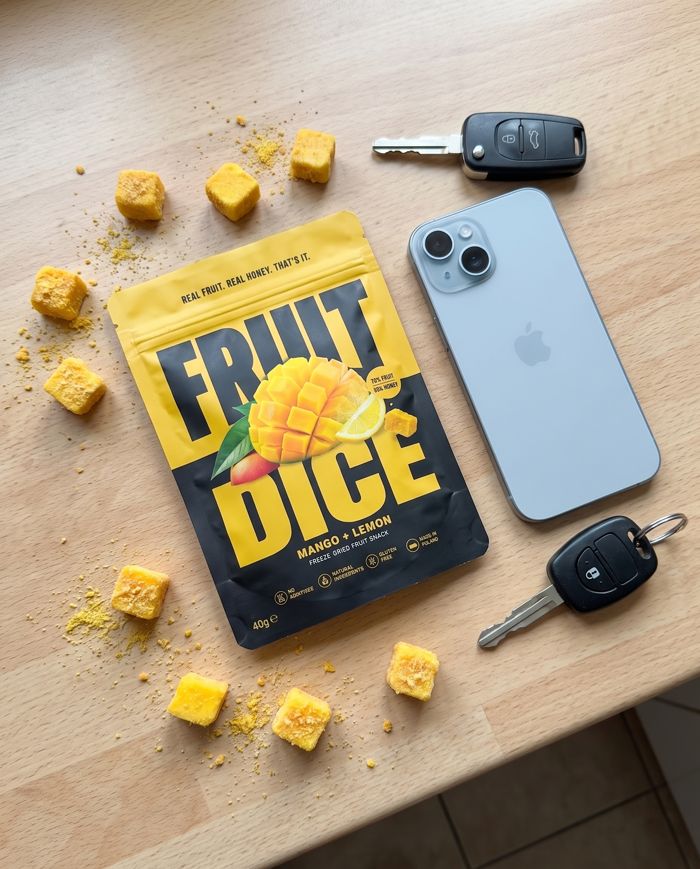 Mango pouch and cubes next to keys and a phone